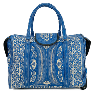 Blue patterned handbag on a white background