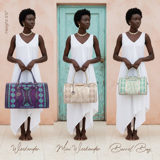 Three bags labeled 'Weekender', 'Mini Weekender', and 'Barrel Bag' held by a model in a white dress.