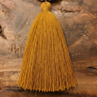 Mustard cotton tassel color option for the earrings.
